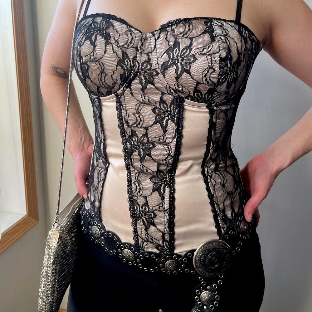 Corset top with removable straps.